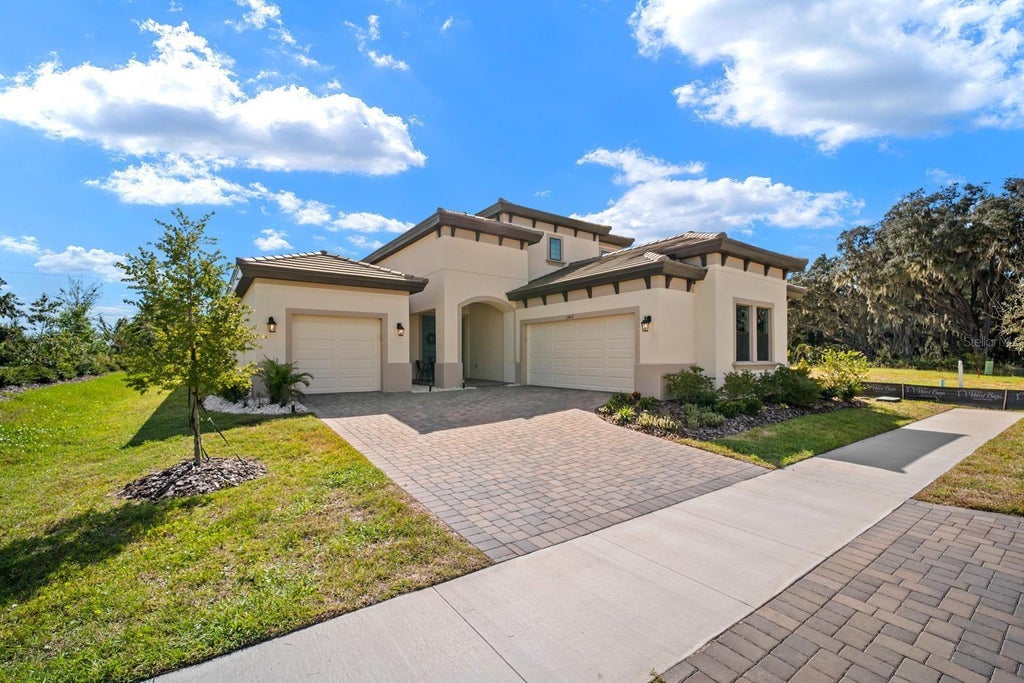 Photo of 13407 Buffalo Mountain Avenue, Riverview, FL 33579 (MLS # TB8561147)