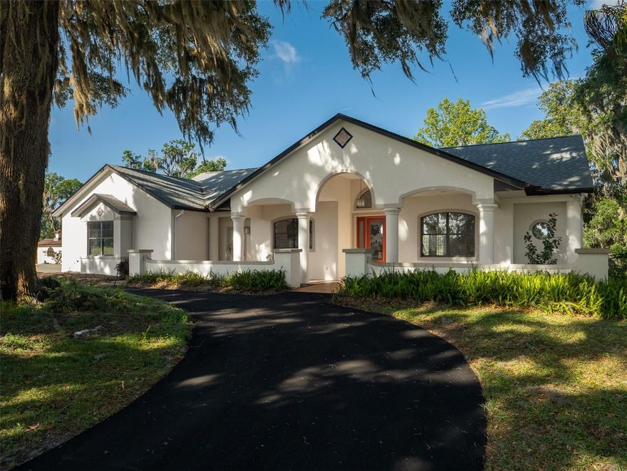 Located just 3 minutes from the Ocala Jockey Club and 16 minutes from the World Equestrian Center and HITS, this 15+ acre farm spans two parcels with rolling pastures, mature oaks, palm trees, and freshly painted fencing! The first home features 3 bedrooms, 2.5 baths, tile flooring and cozy carpet in the bedrooms, high ceilings, a stone gas fireplace, a double oven, and a new water treatment system. It also includes a walk-in handicap tub, whole-house generator, and a screen-enclosed pool. The second home offers 2 bedrooms, 2.5 baths, high ceilings, quartz countertops, stainless appliances, a whole-house generator, and a flexible layout with a private guest/in-law suite entrance. The 6-stall block barn includes A/C tack room, feed room, office, a wash rack that offers hot water, fly spray system, and a workroom. A 1-bedroom barn apartment with full kitchen, bath, laundry, and private entrance is ideal for guests or a farm manager. Additional amenities include run-in sheds, hay and shavings storage, and a covered equipment area—all in a prime NW Marion County location!