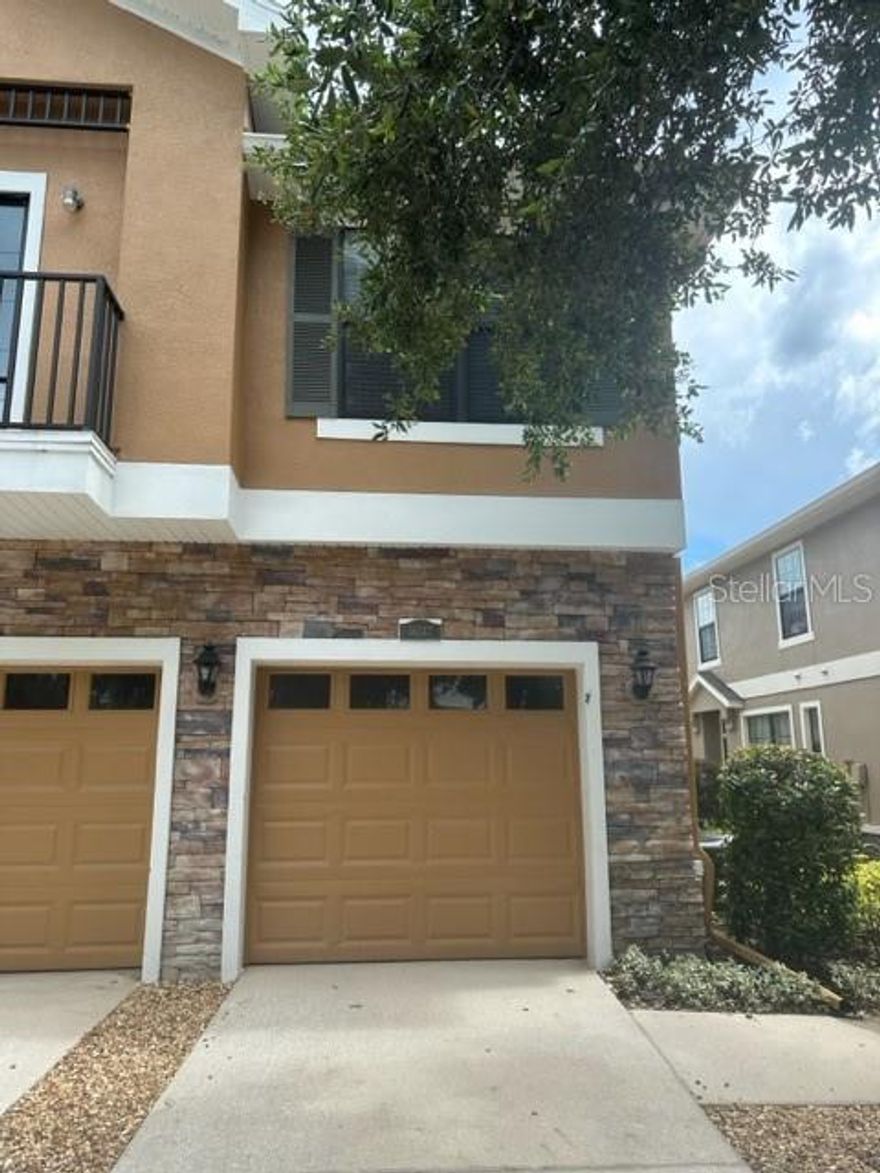 Newly renovated townhome located in the maintenance-free, gated community of Kingletridge at FishHawk Ranch! 2 bedrooms, 2 full bathrooms with a 1-car attached garage with remote and finished floor! Move-in Ready and A-rated Schools!! The living room & dining room combo opens to your private balcony! Large laundry room includes a full-sized, side-by-side washer & dryer set. The remodeled kitchen has a refrigerator, microwave, electric oven & stove. Primary bedroom with en suite bathroom, walk-in closet, and ceiling fan. Primary bathroom with dual sink vanity, linen closet, and shower-tub combo. You can walk to the grocery store! Enjoy the Aquatic Center, multiple pools, fitness center, basketball & tennis courts, skate park, and over 25 miles of trails! You will love it!