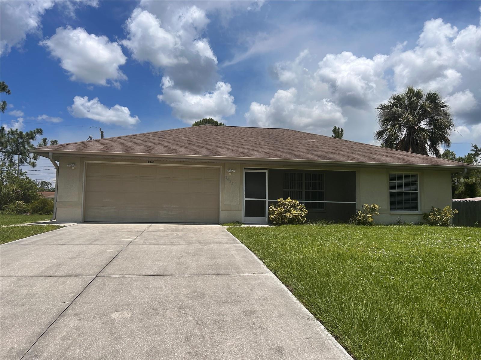 Welcome to this 3-bedroom, 2-bathroom single-family home located in a quiet North Port neighborhood with no HOA or deed restrictions. Built in 2001 with solid concrete block construction, this home features a split-bedroom floor plan, tile and carpet flooring throughout, and a spacious kitchen that opens to the living area—perfect for entertaining. Enjoy your morning coffee on the screened-in front porch or relax on the rear covered patio overlooking the backyard. Additional highlights include a 2-car garage, public water, septic system, and central heating and cooling. Conveniently located near schools, shopping, dining, and easy access to I-75. Don’t miss this opportunity to own a move-in ready home in one of Southwest Florida’s fastest-growing communities!
