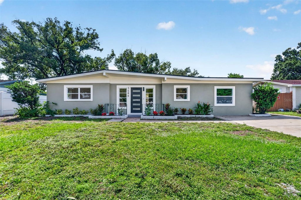 Photo of 3486 Floral Drive, Largo, FL 33771 (MLS # TB8556267)
