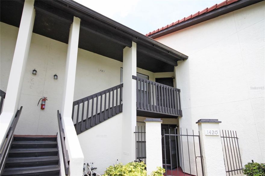 Move-in ready charming 2BR/2BA condo with stylish upgrades and serene pond views! Features include wood-look flooring, granite counters, cappuccino shaker cabinets, & matching stainless steel kitchen appliances. The modern kitchen has a California-style countertop overlooking the living room. Large windows throughout allow plenty of natural light in every room. The large primary suite & secondary bedroom both feature generous walk-in closet.  Both bathrooms are gorgeously upgraded. Double sliders lead to a covered & screened balcony with tranquil pond and conservation views.  Dedicated parking space + external storage unit.  New roof and A/C in 2023.  Community exterior renovation planned - full assessment already paid by seller.  This home will literally get better after you move in!  Amenities include pool, tennis courts & playground. Located conveniently close to UCF, VCC, Research Parkway, Waterford Lakes shopping center, and highway access 408/528/417. Don’t miss the opportunity to own your own home, come see it today!