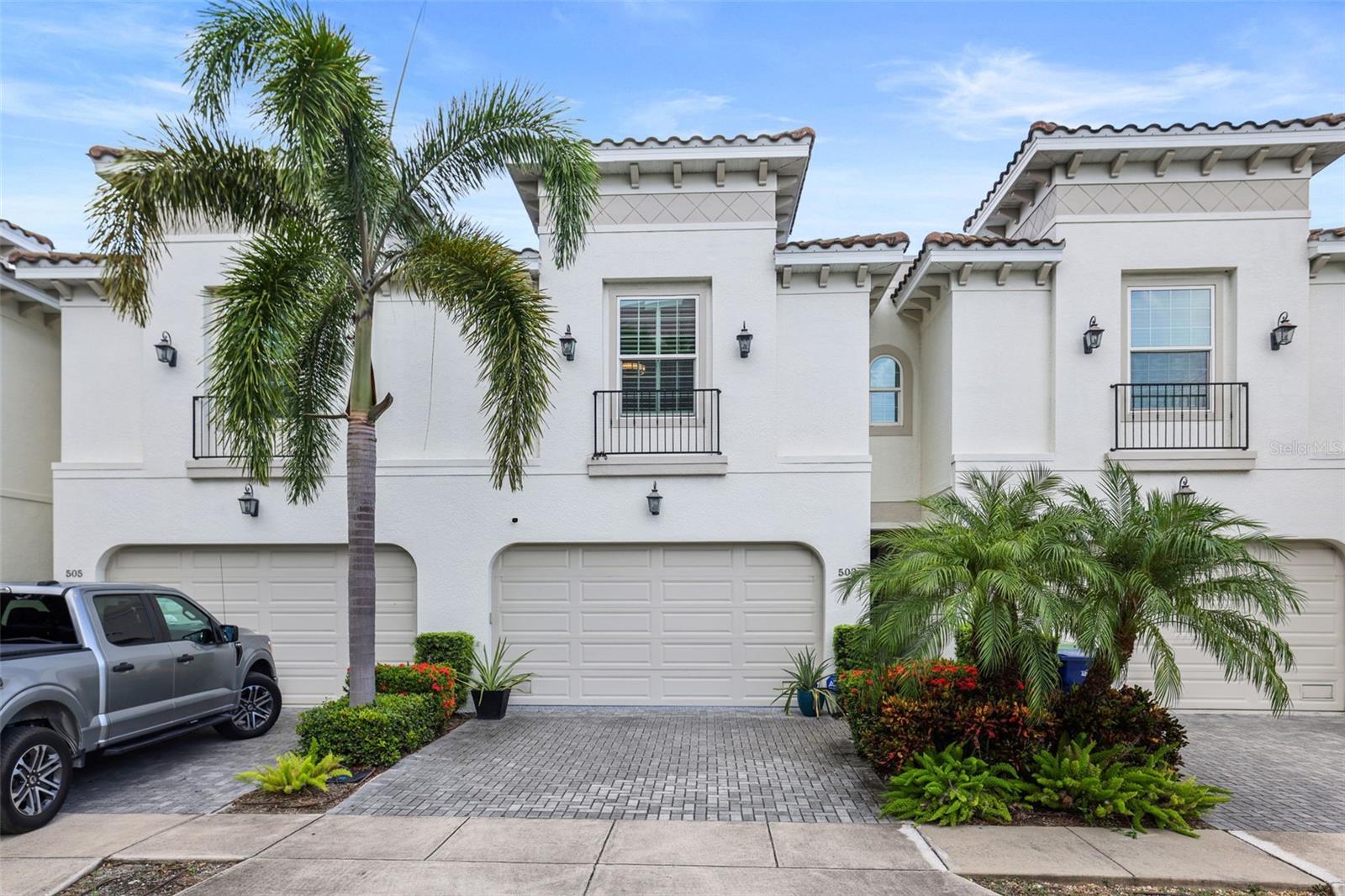 Welcome to this beautifully designed 3 bedroom, 2.5bath townhome in the heart of South Tampa! Built in 2018, this spacious 2,200+ sq ft home offers an open-concept layout with hardwood flooring throughout, high ceilings, and abundant natural light. The gourmet kitchen features stainless steel appliances, quartz countertops, and a large island perfect for entertaining. Upstairs, the generous primary suite includes a walk-in closet and spa-like bath with dual vanities and a glass-enclosed shower. Located in the sought-after West Shore Palms neighborhood, you’ll enjoy quick access to Midtown, International Plaza, Downtown Tampa, and the airport. Zoned for A-rated schools—Grady, Coleman, and Plant High—this home offers the perfect blend of comfort, style, and convenience.