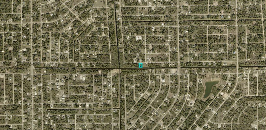 Photo of 928 Alcalde Street E, Lehigh Acres, FL 33974 (MLS # A4689521)