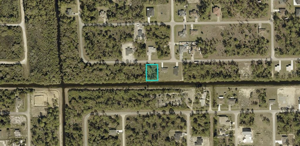 Photo of 928 Alcalde Street E, Lehigh Acres, FL 33974 (MLS # A4689521)
