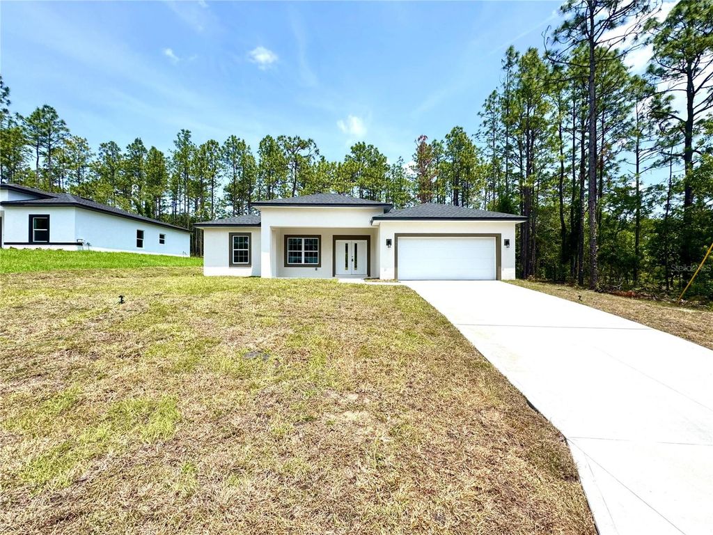 Photo of 1795 W Linden Drive, Citrus Springs, FL 34434 (MLS # O6310611)