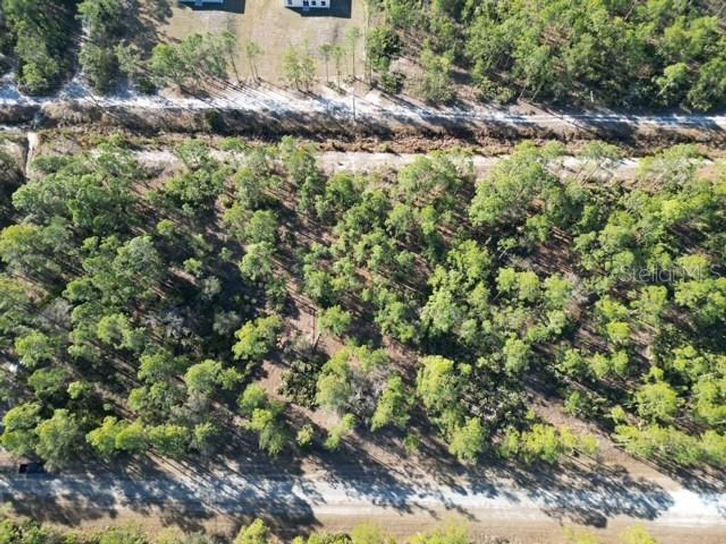 Photo of 705 Laguna Drive, Indian Lake Estates, FL 33855 (MLS # L4959810)