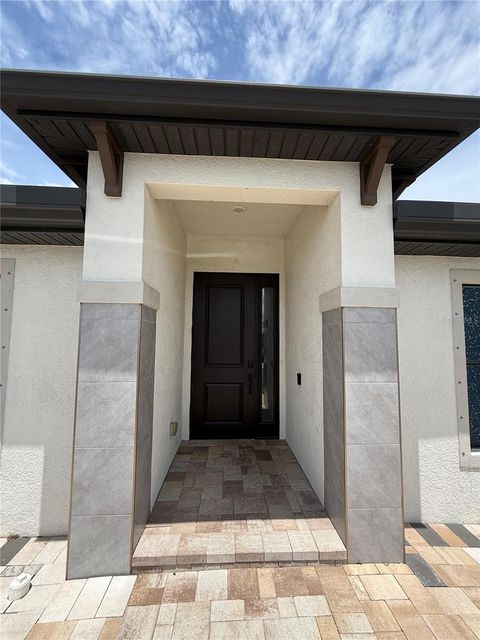 Photo of 2429 NW 8th Terrace, Cape Coral, FL 33993 (MLS # TB8498179)