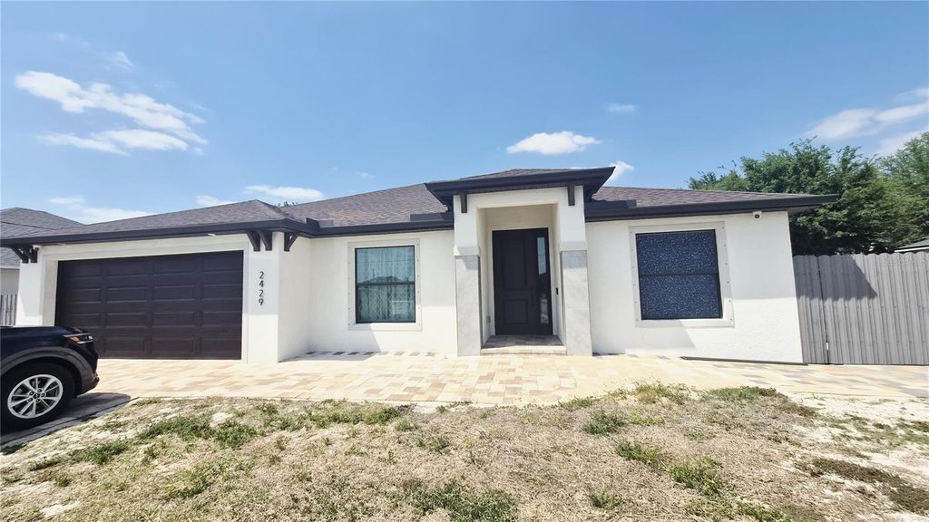 Photo of 2429 NW 8th Terrace, Cape Coral, FL 33993 (MLS # TB8498179)