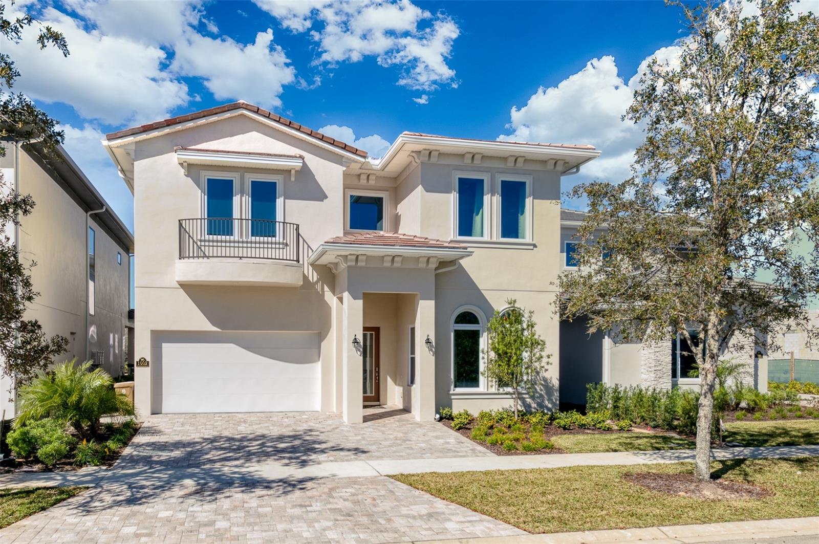 One of the last opportunities to secure a Bear’s Den Residential home overlooking the 18th Hole of Reunion Traditions Golf Course. Superbly located, this home offers endless Sunsets with short walks to a Private Park, Traditions’s Clubhouse and Restaurant and Reunions notable WATERPARK. This is a true TURNKEY opportunity as this home is FULLY FURNISHED and offers access to everything Reunion with a TRANSFERRABLE MEMBERSHIP. This 8BR residence is perfect for large family gatherings and would be ideal for a top level income producing rental. This home offers two bedrooms downstairs an d6 open with a spacious living area, double island in the kitchen and a set aside and separate dining area. Equipped with fantastic outdoor space featuring a SUMMER KITCHEN and also a private sitting area that will be sure to a hit with your gathering of family and friends. If you make it upstairs you will a spacious FLEX ROOM and WET BAR providing a perfect opportunity to enjoy and maximize greater rental income. Come today and see why the BEAR’S DEN is one of Reunion Resort’s most requested locations for ownership!