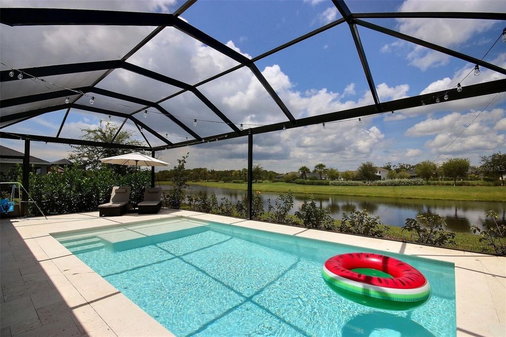 Photo of 10567 Piedra Dr, Palmetto, FL 34221 (MLS # A4662104)