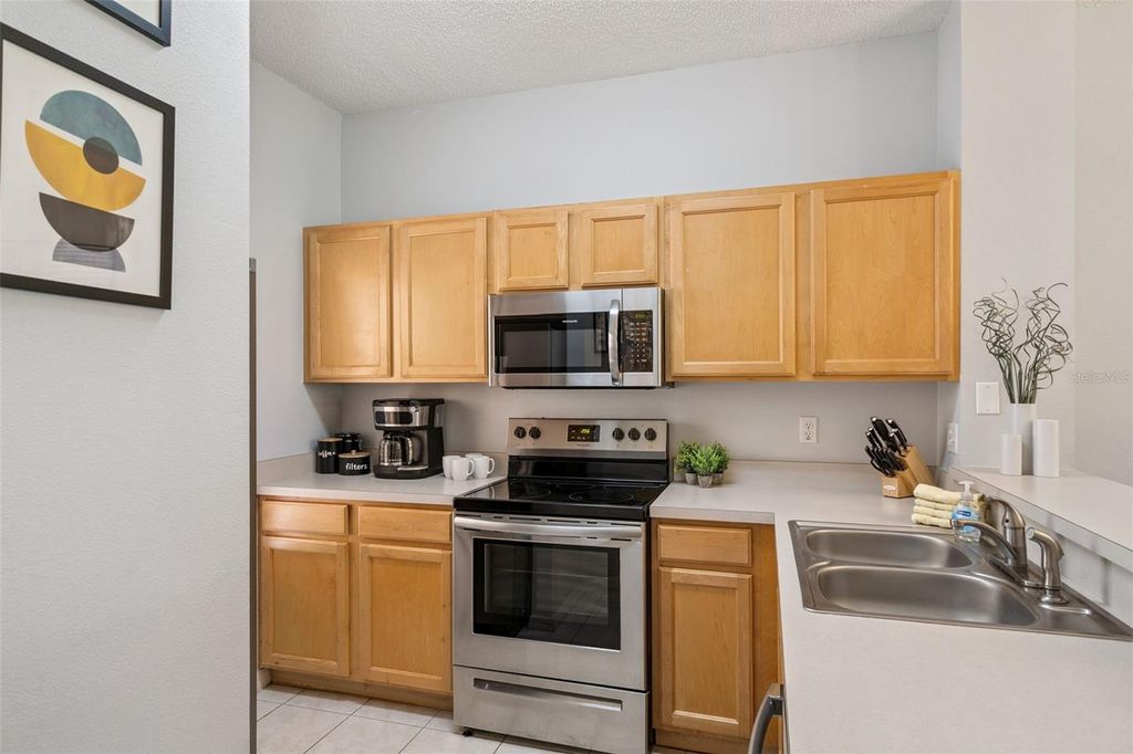 Photo of 8498 Crystal Cove Loop, Kissimmee, FL 34747 (MLS # O6408774)