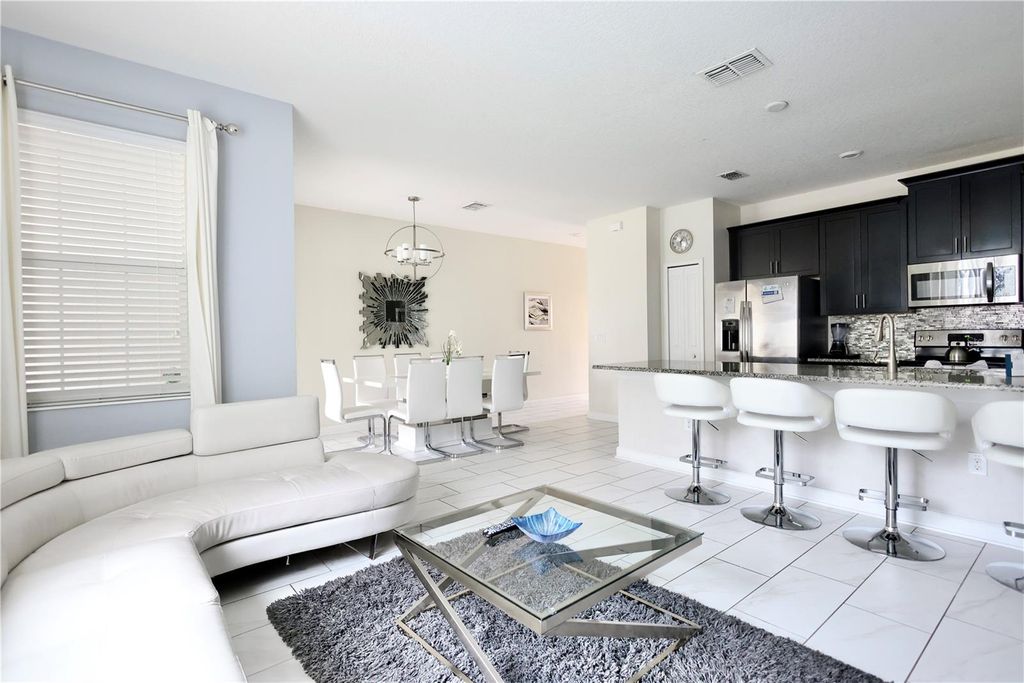 Photo of 9063 Dogleg Drive, Davenport, FL 33896 (MLS # O6395490)
