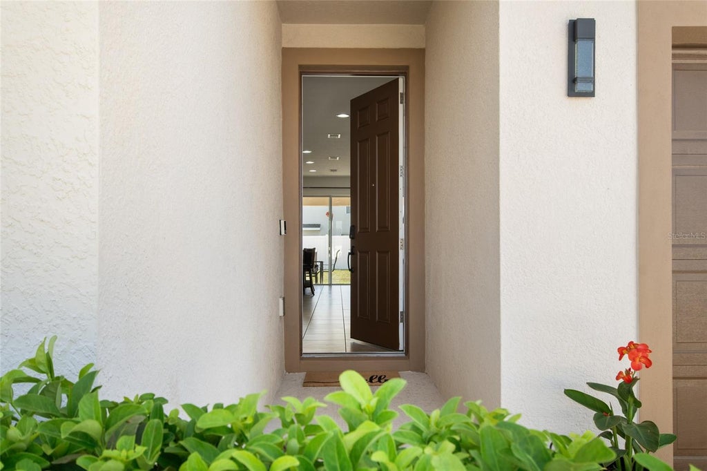 Photo of 1659 Gentle Breeze Drive, Saint Cloud, FL 34771 (MLS # O6417975)