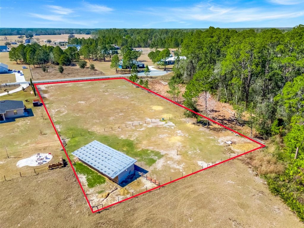 Photo of 18041 San Juan Avenue, Polk City, FL 33868 (MLS # O6386889)