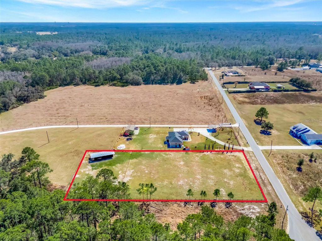 Photo of 18041 San Juan Avenue, Polk City, FL 33868 (MLS # O6386889)