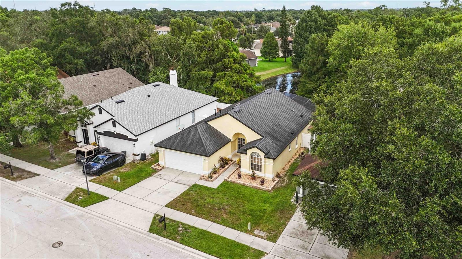 Centrally located between the charm of Oviedo on the Park, Winter Springs, and Winter Park, this well-maintained waterfront home offers a peaceful retreat with everyday conveniences close by. With easy access to major highways and zoned for A-rated schools, the location balances quiet living with connection to the best of Central Florida.
Step inside to find a bright, open layout with vaulted ceilings and abundant natural light. The formal living and dining rooms welcome you at the entry, while just to the right, two secondary bedrooms share a full bath and linen closet.
At the heart of the home, the kitchen opens seamlessly to the family room, all overlooking the screened lanai, pool, and tranquil water views. Toward the back, the spacious primary suite features a walk-in closet, en suite bath, and peaceful views of the water.
Outside, enjoy the sights and sounds of nature—otters, deer, ducks, and turtles frequent this quiet shoreline. It’s the kind of place where you can unwind in the lanai, take in the view, and truly feel at home.
With a 2017 roof, 2024 gas HVAC and water heater, natural gas service, and low HOA dues of just $424 annually, this home offers comfort, efficiency, and value in a welcoming community. Schedule your private showing today.
