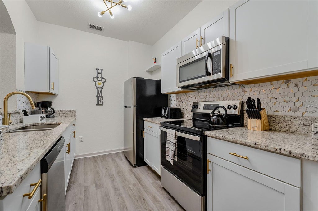 Photo of Kissimmee, FL 34747 (MLS # O6424497)