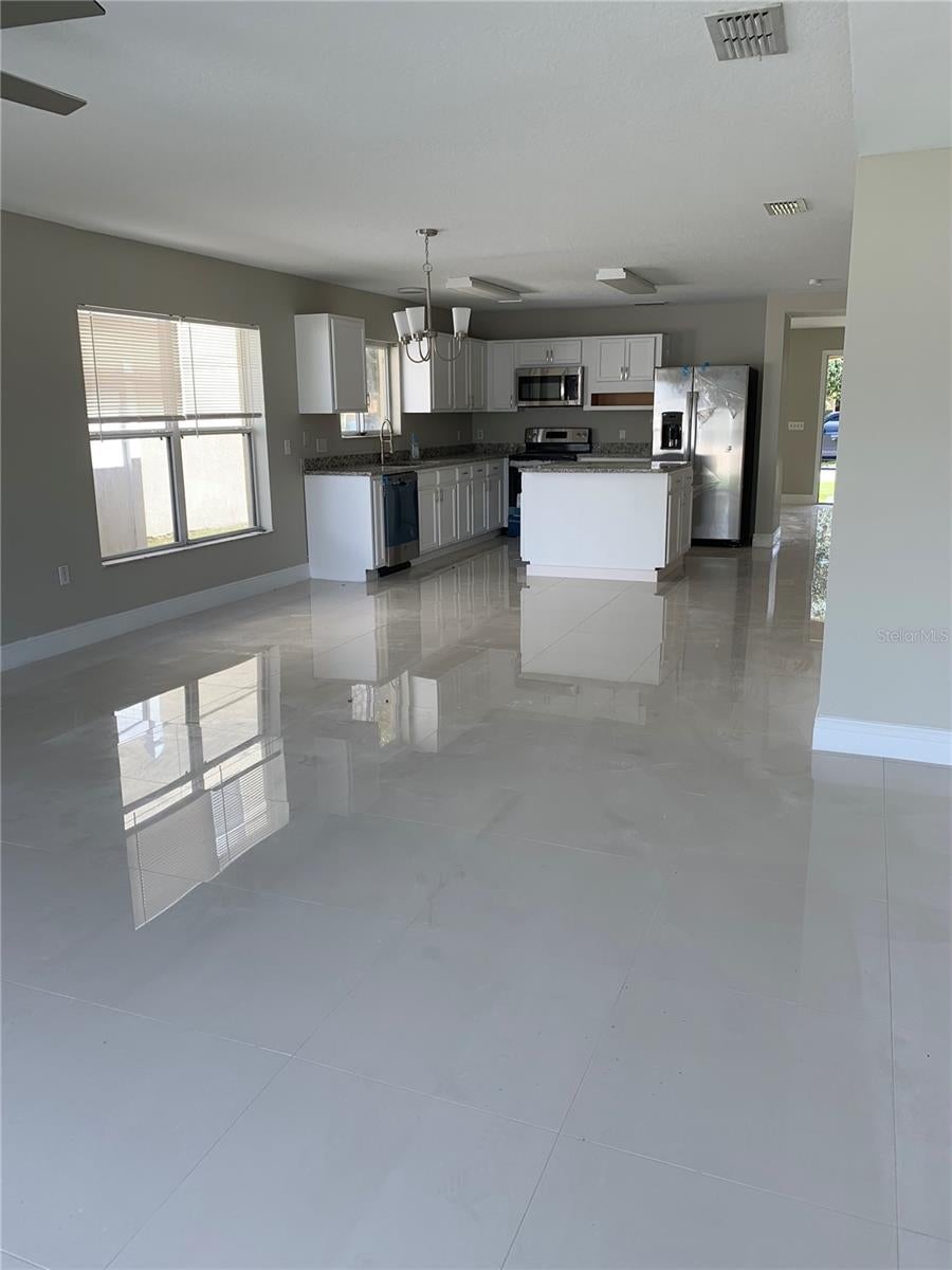 Photo of 1953 Kimlyn Circle, Kissimmee, FL 34758 (MLS # O6438944)