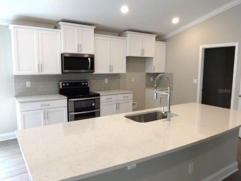 Photo of 43 Lumber Jack Trail, Palm Coast, FL 32137 (MLS # FC292177)
