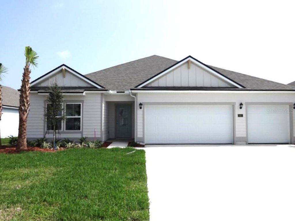 Photo of 43 Lumber Jack Trail, Palm Coast, FL 32137 (MLS # FC292177)