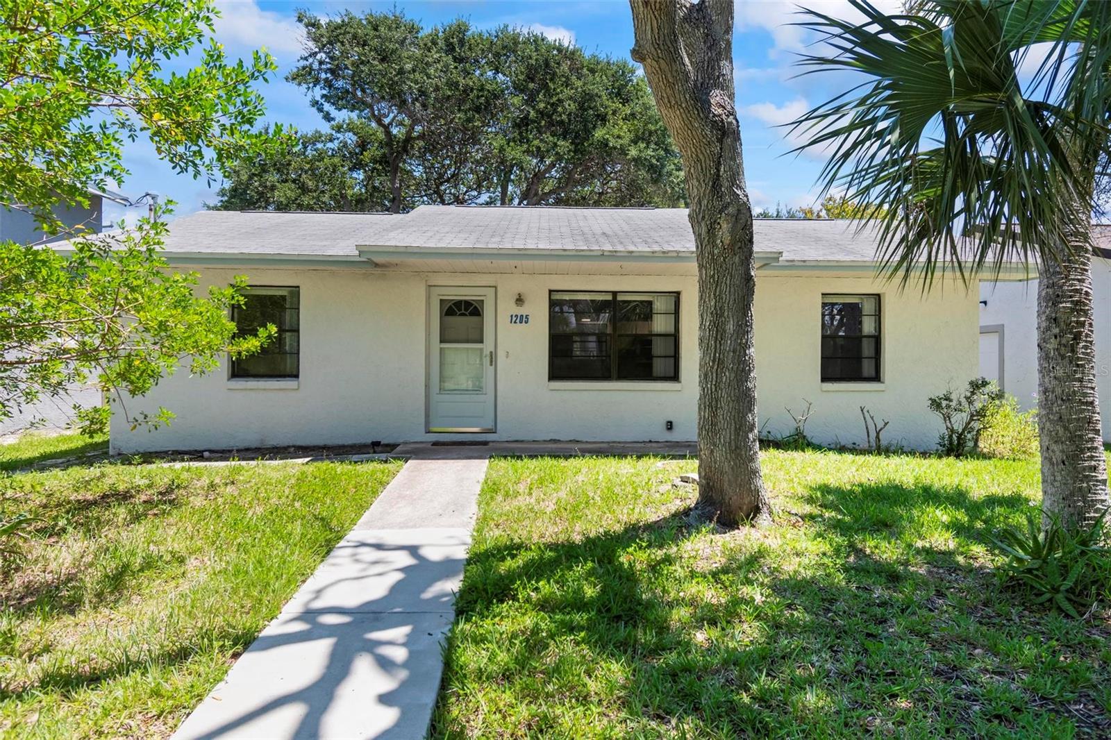 Don't miss out on this opportunity to live in charming Flagler Beach, just a block from the Atlantic Ocean. This modern, unfurnished 2 bedroom, 2 bath home is located in a laid-back coastal community with six miles of scenic beaches, a retro vibe, and locally owned shops and dining along scenic A1A. Bright and airy interior features tile flooring, central AC/heat, and functional living space with no wasted square footage. Dining, kitchen, and living areas flow effortlessly. Both bedrooms are comfortable in size, with two full bathrooms. Easy access to Flagler County amenities while maintaining a quieter beachside lifestyle. 12 month lease with Tenant responsible for all utilities, lawn/shrub maintenance and pest control.