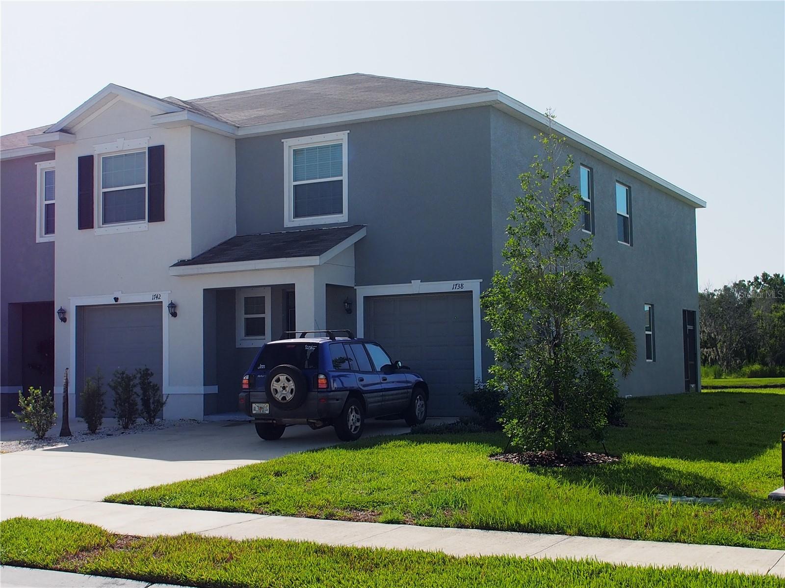 This two-story, all concrete block constructed end-unit townhome has an open concept downstairs that includes a large open kitchen, a powder room, and a large family room that overlooks a covered lanai. The second floor includes a spacious Bedroom with ensuite bath, two additional bedrooms, a second full bathroom, and a laundry area. This home comes with all appliances, including a stainless-steel refrigerator, built-in dishwasher, electric range, microwave, washer, and dryer.