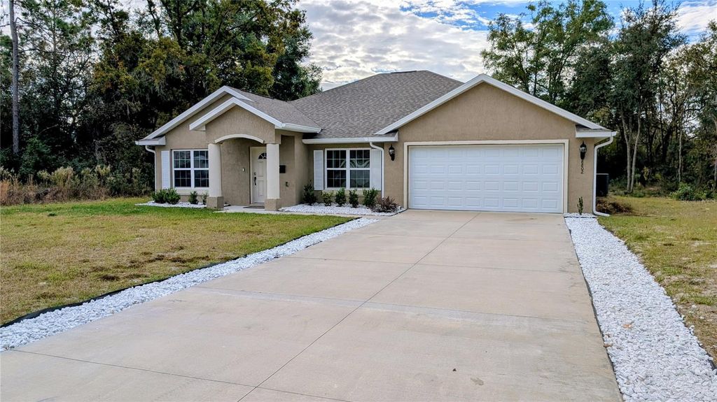 Photo of 8802 SW 135th Place, Ocala, FL 34473 (MLS # O6379033)