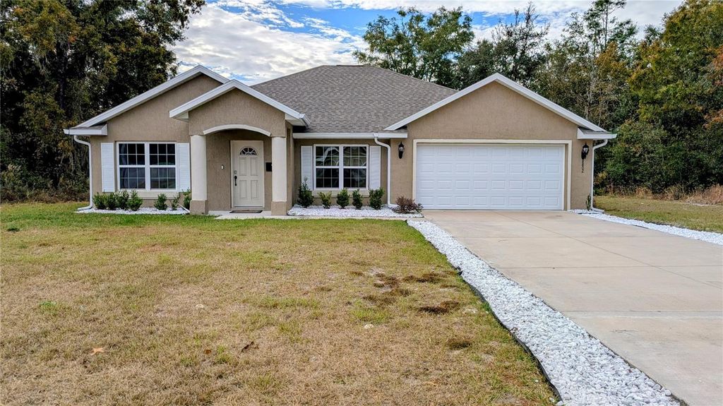 Photo of 8802 SW 135th Place, Ocala, FL 34473 (MLS # O6379033)