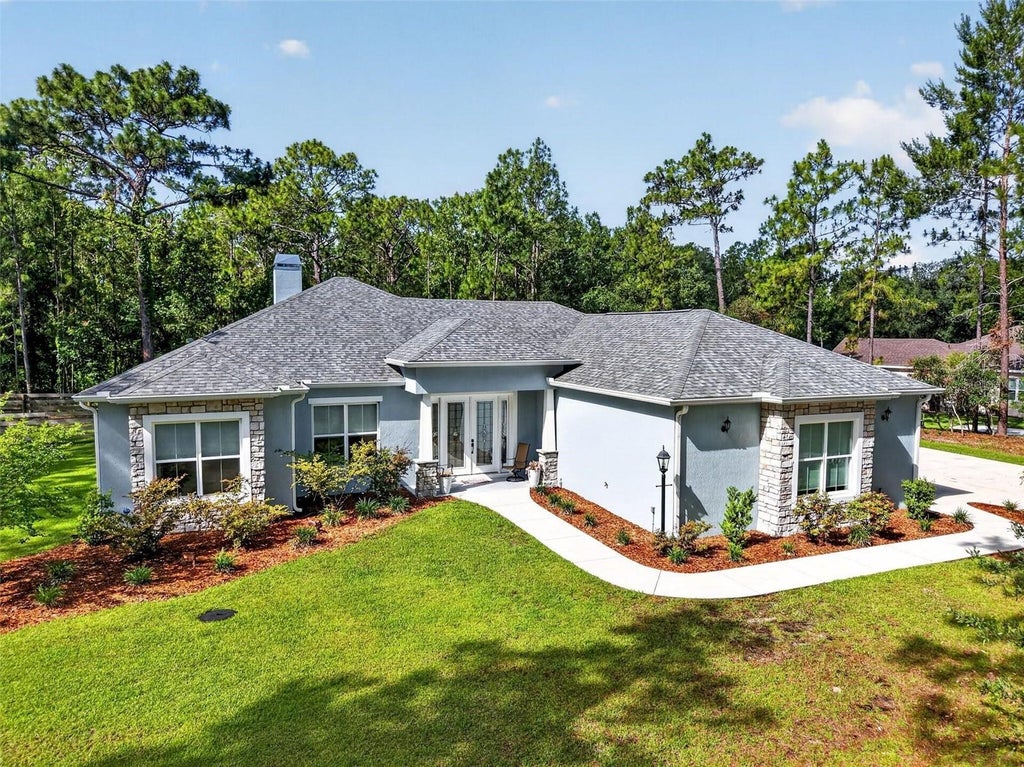 Photo of 2075 County Road 243f, Wildwood, FL 34785 (MLS # O6440053)
