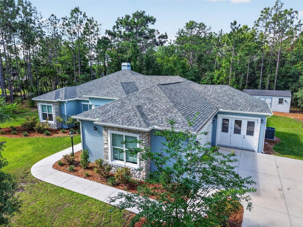 Photo of 2075 County Road 243f, Wildwood, FL 34785 (MLS # O6440053)