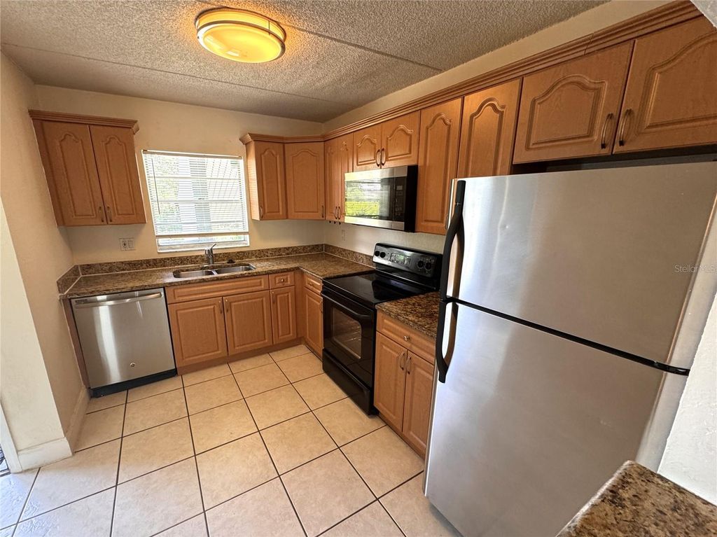 Photo of 2850 Somerset Park Drive #201, Tampa, FL 33613 (MLS # O6349705)