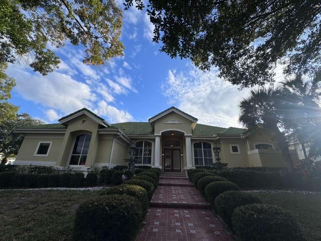 Photo of 7600 Debeaubien Drive, Orlando, FL 32835 (MLS # G5107219)