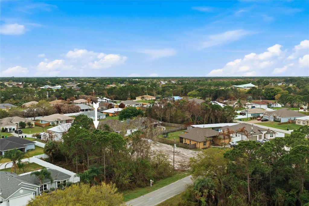 Photo of 6447 NW Hemlock St, Port Saint Lucie, FL 34986 (MLS # TB8489831)