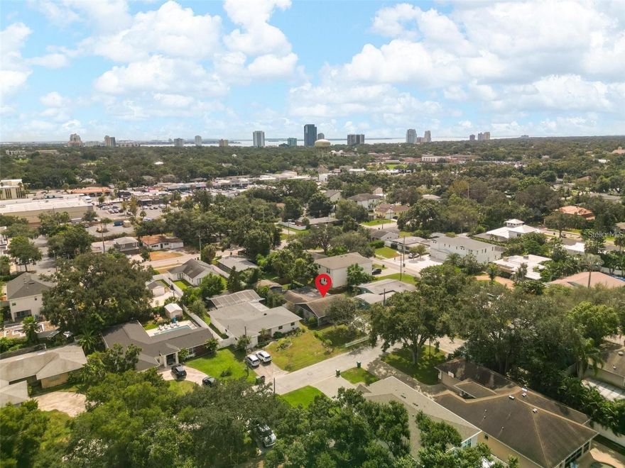 **PLANT YOUR SOUTH TAMPA ROOTS!** Positioned on a rare 136-ft deep lot in the heart of South Tampa, this property presents an exceptional opportunity for builders, investors, or end users looking to capitalize on one of the area’s most desirable neighborhoods! Located within the coveted PLANT HIGH SCHOOL DISTRICT and situated in HIGH-AND-DRY FLOOD ZONE X, this is the kind of lot that’s becoming increasingly hard to find. Whether you envision a luxury new build with a pool, expansive outdoor living, or maximizing the depth for a larger footprint, this property gives you the flexibility to execute. The existing 3-bedroom, 2-bath home with nearly 2,000 sqft of living space provides immediate usability, rental potential, or a comfortable place to live while you finalize building plans. While it is livable, it has about $6500 in electrical and roofing punchlist items to make it financeable. Additionally, the detached 23' x 19' block workshop opens the door for future conversion into a guest house, home gym, or income-producing ADU—further enhancing the overall value of the property. Set on a quiet street just minutes from South Tampa’s best amenities—including Bern’s Steakhouse, Hyde Park Village, Palma Ceia Golf & Country Club, and Bayshore Boulevard—you’re perfectly positioned for both lifestyle and long-term appreciation. Downtown Tampa is only 10 minutes away, Tampa International Airport 15 minutes, and the Gulf beaches within 30 minutes. At this rock bottom price, the seller is considering cash only, As-Is, no contingency offers. Opportunities like this—where lot value, location, and upside align—don’t come around often! Secure the land now and build your vision later!