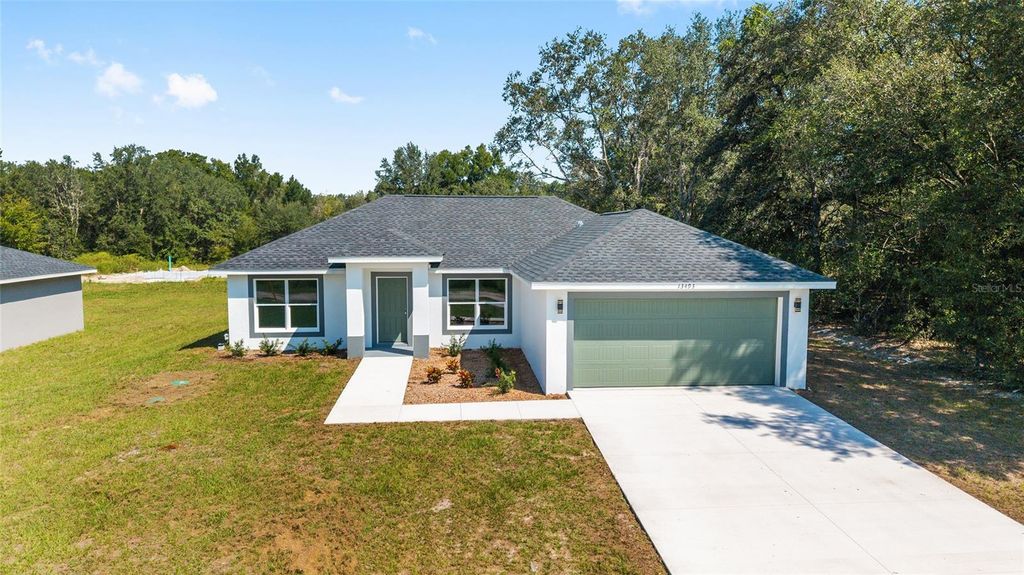 Photo of 13493 SW 112th Place, Dunnellon, FL 34432 (MLS # OM709283)