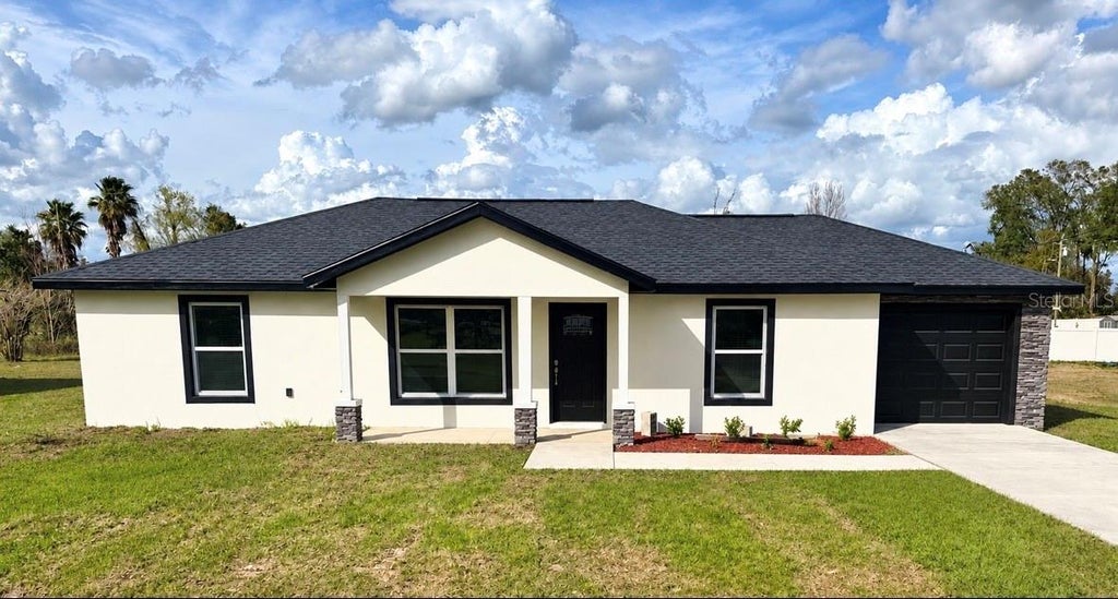 Photo of 21950 SW Marine Boulevard, Dunnellon, FL 34431 (MLS # OM731852)