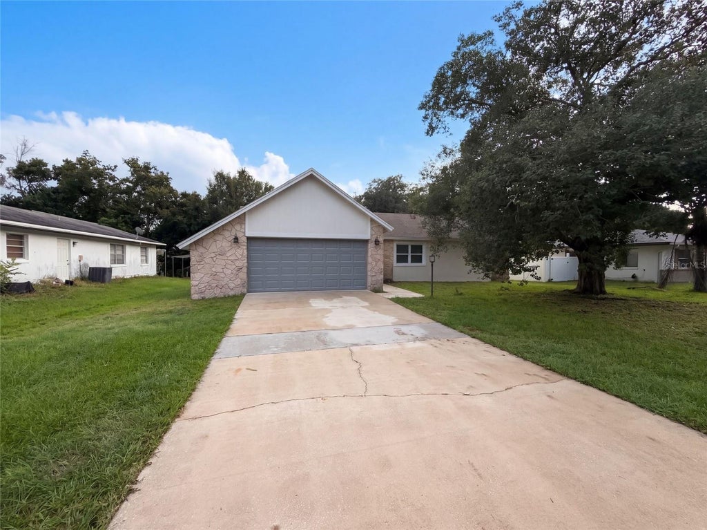 Photo of 881 Vicksburg Street, Deltona, FL 32725 (MLS # O6445595)