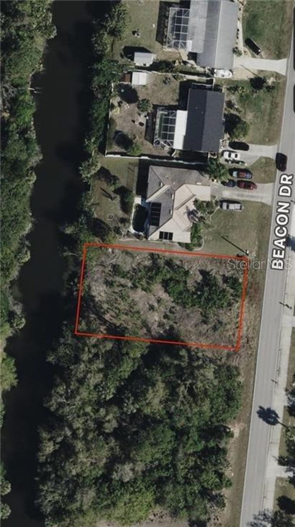 Photo of 1467 Beacon Drive, Port Charlotte, FL 33952 (MLS # C7515290)