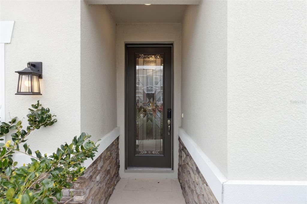 Photo of 654 Heritage Square Drive, Haines City, FL 33844 (MLS # O6379830)