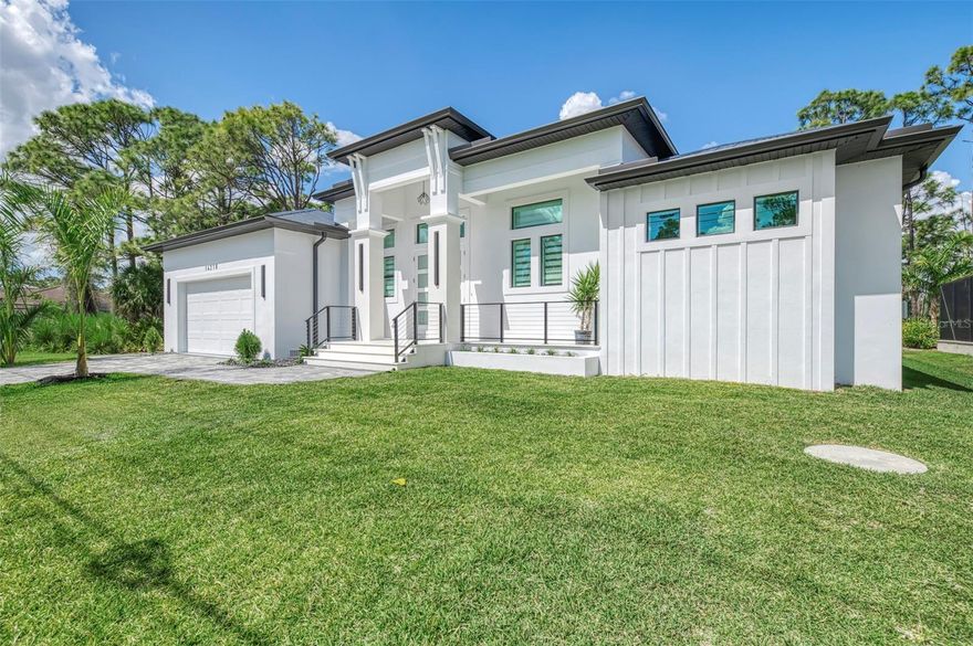 Under Construction. Welcome to this stunning new construction luxury pool home offering over 2,500 sq ft of living space in the desirable South Gulf Cove area of Port Charlotte. Designed for both comfort and entertaining, this spacious residence features 3 bedrooms, 3 bathrooms, plus a private office, along with an open-concept layout highlighted by impressive 12-foot ceilings in the main living area.

Step inside to discover tile flooring throughout and a bright living space that seamlessly connects to the outdoor living area through oversized sliders, creating the perfect indoor-outdoor Florida lifestyle. The chef’s kitchen is the centerpiece of the home, featuring quartz countertops, soft-close cabinetry, a large island, double ovens, and a modern hood vent, making it ideal for both everyday living and entertaining.

Enjoy outdoor living with a saltwater pool and heated spa, surrounded by an expansive lanai and a fully equipped outdoor kitchen—perfect for hosting family and friends year-round. The exterior also features pavers in the driveway and pool deck, enhancing both durability and curb appeal.

Additional premium upgrades include a metal roof, energy-efficient foam insulation, and an attached 2-car garage, combining luxury with long-term efficiency and durability.

This exceptional property blends modern design, high-end finishes, offering the perfect opportunity to enjoy the Florida lifestyle in a brand-new luxury home.

Note: Photos are from a similar completed model. Finishes and features may vary.