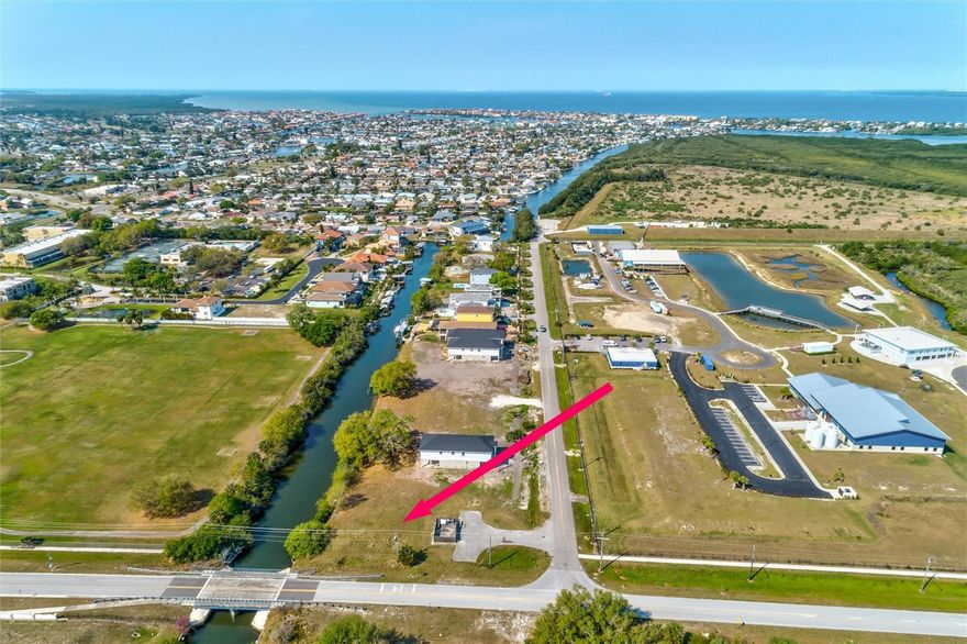 MASSIVE WATERFRONT LOT! At just over a 1/2 acre nestled in a quiet Apollo Beach neighborhood on a dead end road this 24,120 Sq Ft corner lot provides a rare opportunity to build your dream waterfront estate. With 134ft of canal frontage you have the space for dock and multiple lifts to store all of your water toys. There are no fixed bridges providing unrestricted access to Tampa Bay. There are no deed restrictions as the neighborhood is not governed by any HOA and there are no CDD fees unlike the vast majority of newly constructed waterfront neighborhoods in the surrounding area. Wether you want to reel in an inshore slay surrounded by world renown fishing, paddle board throughout the expansive waterways in Apollo Beach, or just soak in some rays in the Bay on a relaxing boating day, this lot offers an unique opportunity to build your dream home and live the ultimate Florida lifestyle.