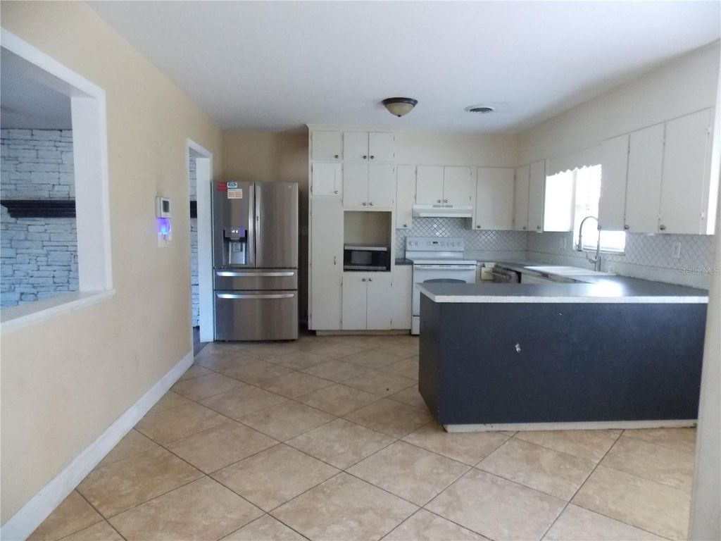 Photo of 1827 SE 7th Avenue, Ocala, FL 34471 (MLS # OM715257)