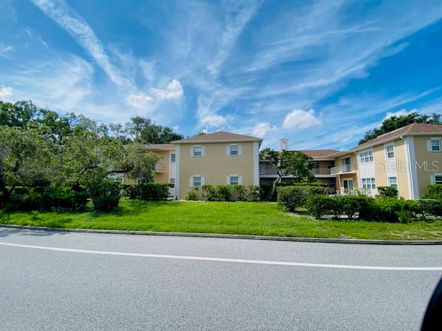 Bright, clean, and move-in ready! This charming 2-bedroom, 2-bath condo in the desirable Bardmoor area offers a peaceful second-floor unit with serene views. Enjoy spacious living with large windows, stylish oversized marble-look tile flooring, and fresh neutral paint throughout. The unit features an updated ceiling fan, ample natural light, and a well-maintained community with manicured landscaping and walkways. Located just minutes from shopping, dining, golf courses, and Gulf beaches — this is Florida living at its best!