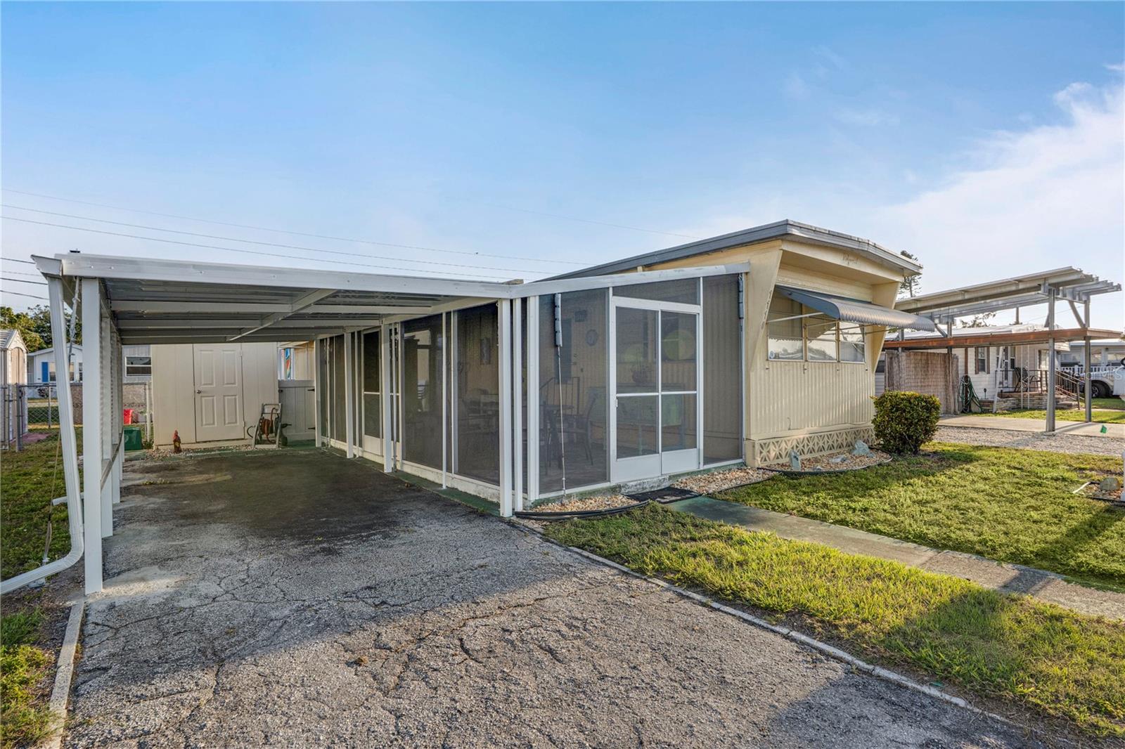 An Opportunity You Can't Miss! Your Florida Sanctuary Awaits!
Calling all dreamers 55 and better—get ready to fall in LOVE with this inviting 1-bedroom, 1-bath mobile home that’s bursting with charm, comfort, and unbeatable value! Whether you're seeking peace, a splash of excitement, or the perfect place to enjoy both, this home delivers in every way.
Fully Furnished – Just bring your toothbrush! This move-in-ready gem comes complete with a washer & dryer, so you can live more and clean less!
You Own the Land – That’s right—no lot rent here! Enjoy the freedom and long-term value of owning your spacious, oversized lot, perfect for relaxing, entertaining, gardening, or whatever brings you joy.
Pet-Friendly Paradise – Got a large dog? Bring them along! The fenced yard gives your furry friend plenty of space to stretch, play, and soak up the Florida sunshine.
DIY Heaven – Love to tinker, build, or craft? This home comes with three sheds PLUS a dedicated workshop area, offering the perfect setup for hobbies, storage, and creative projects.
Solid & Secure – The seller has added 14 additional tie downs, giving you enhanced stability and priceless peace of mind during storm season and beyond.
Low HOA Fees – Only $135/month! That includes water, sewer, and trash pickup—an incredible value that helps you stretch your budget without sacrificing convenience.
Vibrant Community Perks – Take a dip in the heated community pool, challenge friends to a game of shuffleboard or pickleball, or join in the many social events that make this a truly friendly and welcoming place to call home. Whether you're here part-time or full-time, there's always something fun to do and someone new to meet.
Thoughtfully designed for maximum comfort and elegance, this home is an ideal sanctuary for a solo resident or a dynamic duo ready to embrace affordable, easy living in a peaceful, community-rich setting.
So… are you excited yet?!
This is the kind of opportunity that doesn’t come around often—a beautiful, low-maintenance, pet-loving retreat where you can live your best Florida life without breaking the bank.
Don’t wait—opportunities like this don’t knock twice! Call today and make this delightful haven yours!
