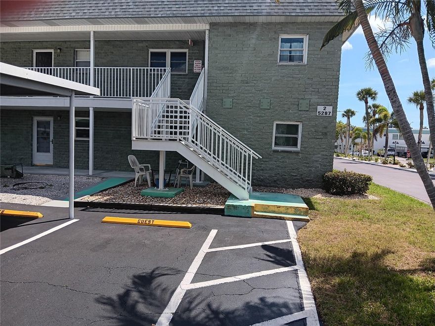 Nice bright end unit with loads of windows. Window coverings included. Beautiful 22 inch tile throughout. Very large livng/dining combo as well as good sized bedrooms. Building roof and HVAC unit less then 3 years old. 2nd floor walk up with covered parking right in front of unit. Well maintained community with loads of ammenities. On site office, large clubhouse, billiards etc. Convient location close to shopping, bus etc.