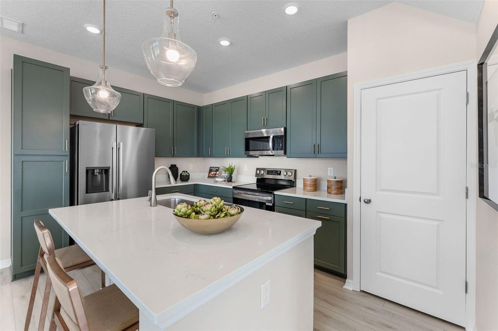 Photo of 616 Emerald Grove Drive, Apopka, FL 32703 (MLS # W7881952)