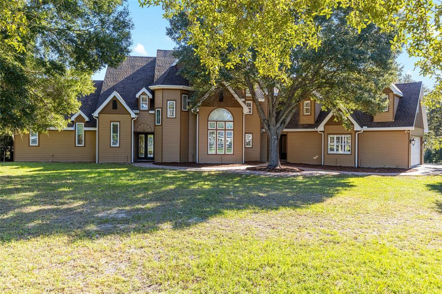 Welcome to a beautifully updated farm tucked inside the gates of Saddlebrook Equestrian Park—one of Ocala’s most sought-after equestrian communities where horse safety and serene country living come first. Perfectly positioned just minutes from the World Equestrian Center (WEC), this 6+ acre property combines functionality, elegance, and the true essence of Ocala’s horse country lifestyle.
The property has been thoughtfully enhanced with recent upgrades including a roof (2024), well pump (2025), septic and drain field (2025), and windows (2022). The home and grounds have been freshly power washed, mulched, and landscaped, creating an inviting, move-in-ready setting from day one, Icynene insulation throughout the attic. 
The fenced and cross-fenced pastures are ready for your horses, featuring a center-aisle 7-stall barn with a tack room, wide breezeways, and exterior stall doors that open directly to turnout. A community bridle path encircles the neighborhood, allowing you to ride privately through peaceful surroundings.
Inside the home, double doors open to a light-filled great room with soaring ceilings and panoramic pasture views. The island kitchen is designed for gathering, offering granite countertops, stainless-steel appliances, and stone accents that lend rustic charm with modern convenience. Dual staircases on either side of the home add architectural appeal and flow.
A spacious studio apartment above the garage provides versatility—perfect for guests, in-laws, or a trainer’s quarters. Complete with a full bath, dishwasher, sink, cabinets, and a private balcony overlooking the farm, it’s the ideal blend of comfort and functionality.
This property embodies the best of Ocala living—a private equestrian retreat close to WEC, Golden Ocala, and top amenities, yet peacefully nestled within a gated community built for riders and dreamers alike.