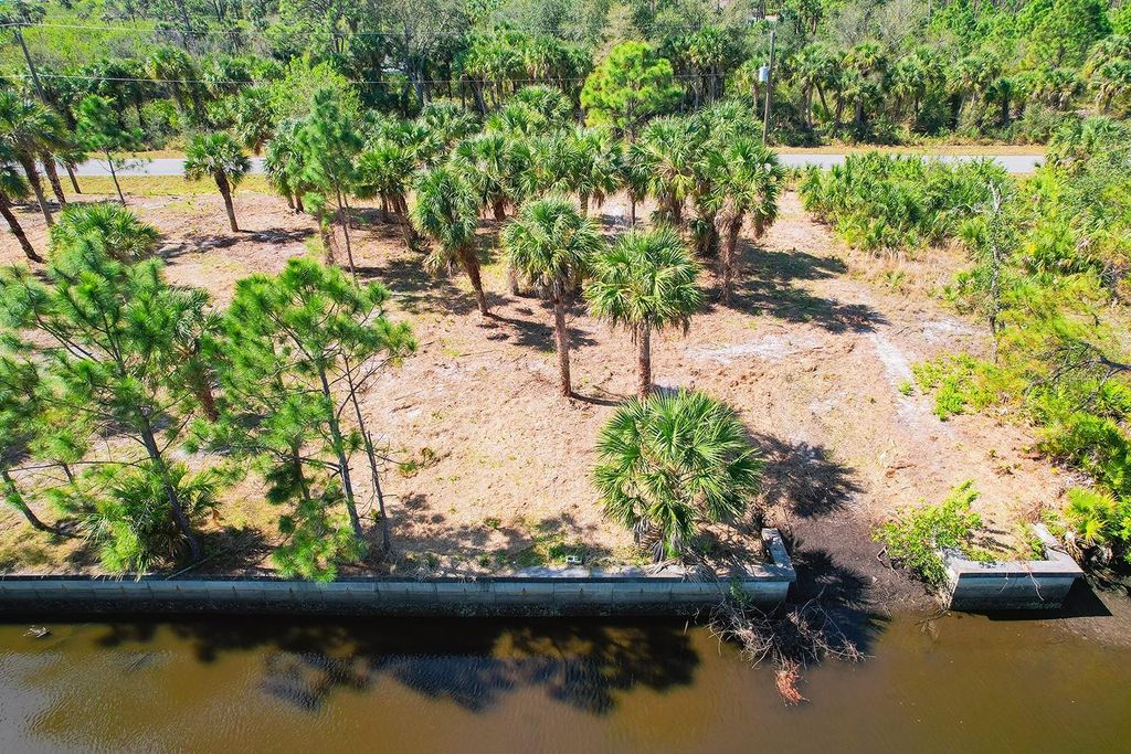 Photo of 496 Mcdill Drive, Port Charlotte, FL 33953 (MLS # TB8355847)