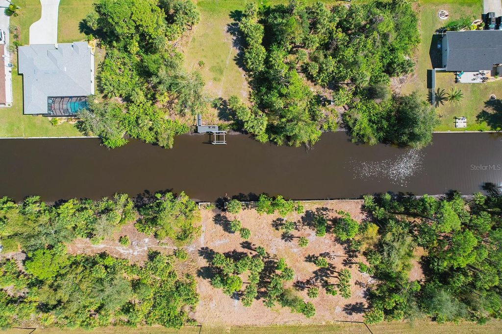 Photo of 496 Mcdill Drive, Port Charlotte, FL 33953 (MLS # TB8355847)